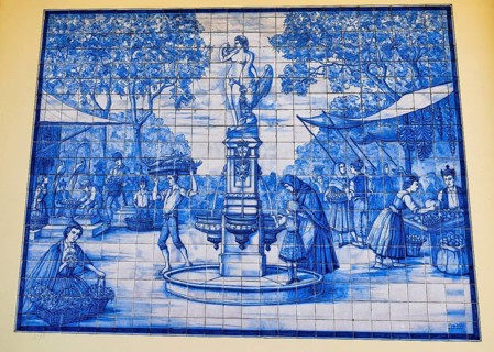 Old azulejos (wall tiles) with historical motifs in Funchal, Madeira