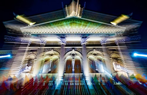 Beautiful Bundeshaus Illuminated Parliament Building or Federal Palace with Canton Flags at Night