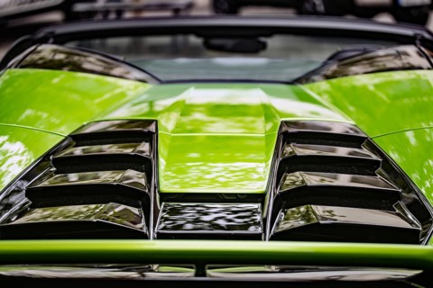 WETZLAR, Germany 2022-04-23: Lamborgini metallic logo closeup on Lamborghini car displayed