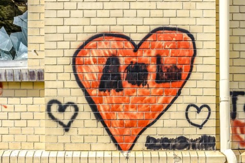 A heart sprayed on a wall as a background
