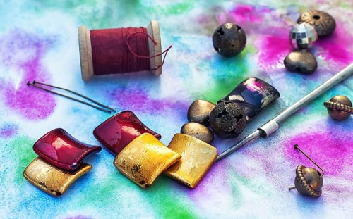 Beads, thread, wire and tools for needlework in variety of styles