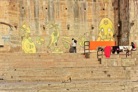 Varanasi, Uttar Pradesh, India, Asia, Wall paintings next to the steps of a Ganges Ghat with