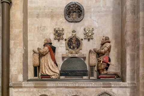 Canterbury, United Kingdom, 10 September, 2022: statue and artwork of praying men inside the