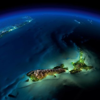Highly detailed Earth, illuminated by moonlight. The glow of cities sheds light on the detailed