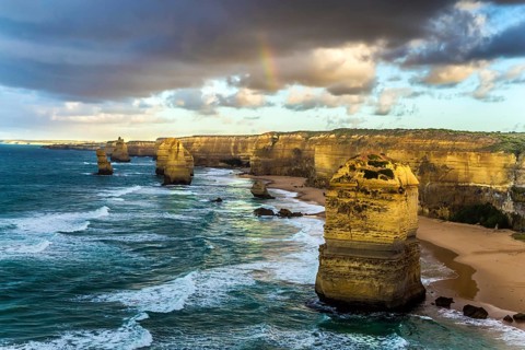 The rocks Twelve Apostles in an ocean storm surf. Travel to Australia. Fantastic morning light on