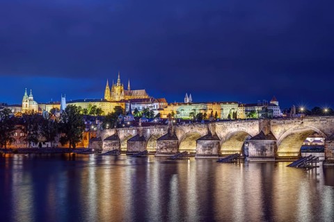 The castle, the cathedral and the famous Charles Bridge in Prague by night