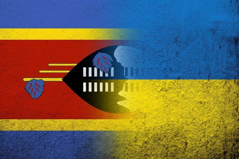 The Kingdom of Eswatini Swaziland National flag with National flag of Ukraine. Grunge background