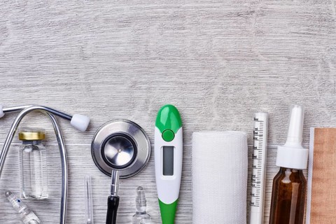 Medical instruments on wooden background. Opening of a pharmacy
