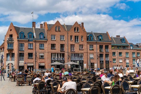 People enjoying drinks at the square in front of Lille Cathedral at Lille, France, Europe