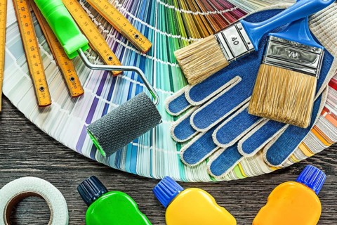 Composition of paint equipment on wooden board
