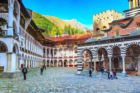 Rila, Bulgaria, October 27, 2017: Rila monastery view with autumn mountain trees at background,