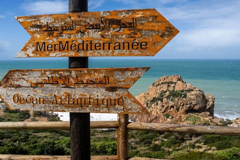 Sign indicating the direction of the Mediterranean Sea and the Atlantic Ocean, Caves of Hercules,