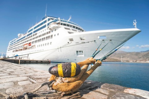 Big white cruise ship. Synny day. Greece