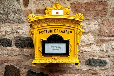 Historic yellow May box in an old town in Germany