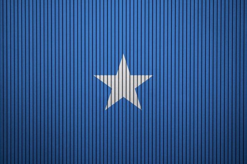 Somalia Flag painted on the cracked grunge concrete wall