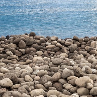 Volcanic rock beach and sea- ideal for backgrounds