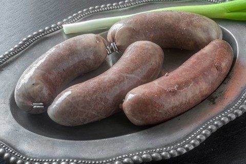 Black pudding on a tin plate