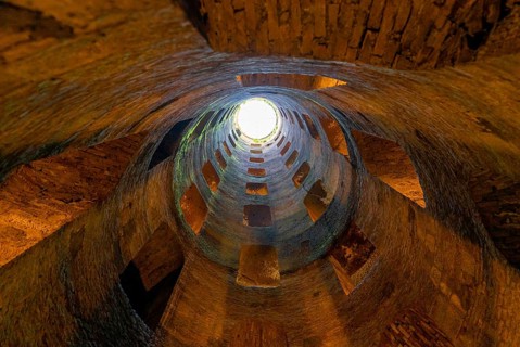 Orvieto, Italy, 18 November, 2023: view looking up from St. Patrick's Well in downtown Orvieto,