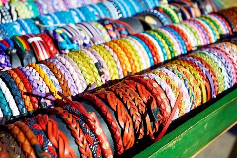 Bracelets of leather in colorful colors hand crafted in an outdoor market