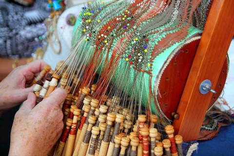 Bobbin laze openwork fabric created interlacing thread on bobbins using a pillow