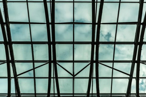 Portugal, 12 28 2018: Abstract patterns and lines of the glass and steel roof at the Vasco Da Gama