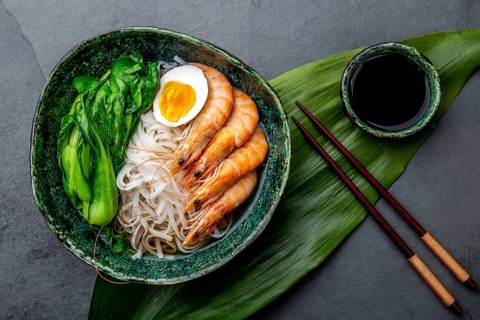 Food, Asian rice noodles with shrimps on gray background