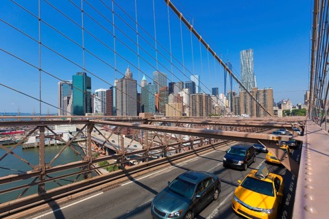 Brooklyn Bridge traffic and Manhattan New York City US USA