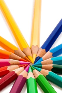 Many different coloured pencils on a white background. Austria