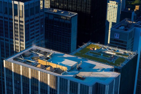 Manhattan skyscrapers roofs with fans, and steam, New York, USA, North America