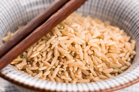 Raw brown rice in a bowl