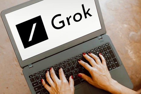 In this photo illustration, the xAI Grok logo is displayed on a notebook screen
