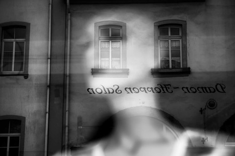 Reflection in a windowpane, women's fashion, Bad Karlshafen, Weser Uplands, Weserbergland, Hesse,