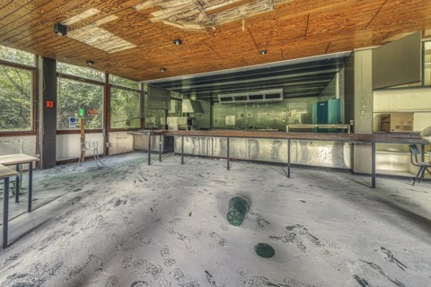 Abandoned, dusty laboratory with daylight streaming in and broken furniture, Institute of Molecular