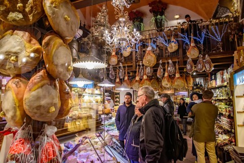 Shop selling cheese and ham in Bologna, Italy, Europe
