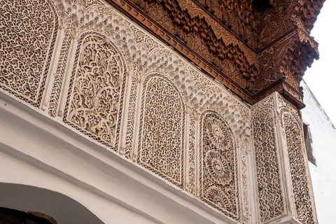 Beautiful ornate relief at a facade of a madrasa in Fes, a Koran school, Morocco, Africa