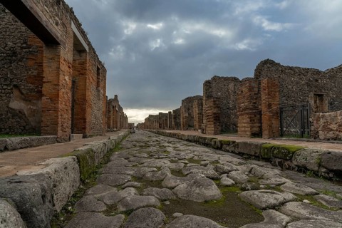 Pompei, Italy, 25 November, 2023: tyoical city street and houses in the ancient Roman town of