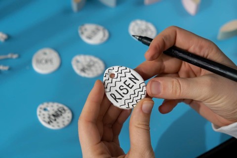 Master class writing word RISEN on EASTER clay egg Children air dry clay activity handicraft idea.