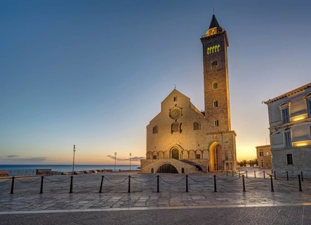 The Piazza Duomo with the famous cathedral in Trani at dusk