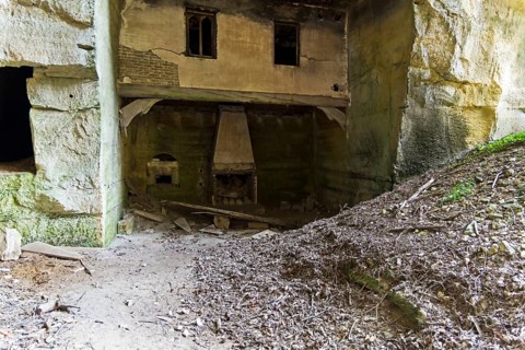 Destroyed fragments of an underground castle in the quarries under the castle of Grand Mello,