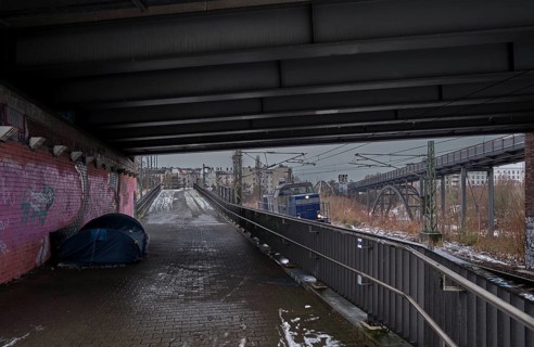 Germany, Berlin, 10.01.2025, subway Behmbrücke, tent of a homeless person, diesel locomotive,