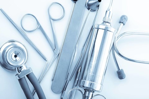 Medical instruments for ENT doctor on white