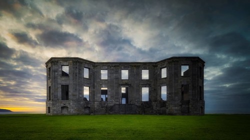 Ruins of Downhill Demesne with dramatic, moody sunset, front view, National Trust, Castlerock,