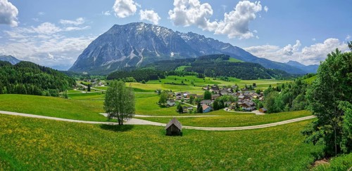 Summer austrian landscape with Grimming mountain (2.351 m), an isolated peak in the Dachstein