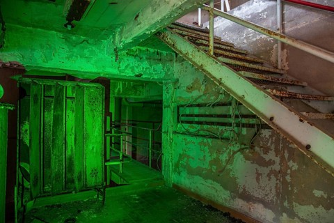Old abandoned paper factory. Historic and typical factory building as a lost place. Destruction and