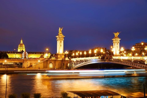 Pont Alexandre III in Paris France sunset over Seine river