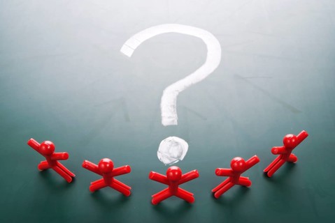 Business team face a big question mark.