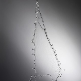 Water drop splash with grey background