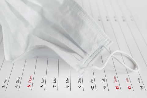 Montly calendar with self protection face mask. Coronavirus concept. Beginning / end of the