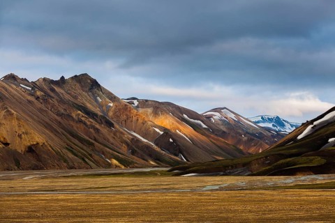 Mountains and hills with blotches of snow in Landmannalaugar, Iceland, Europe
