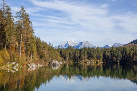 Mountain massif Hoher Göll with forest at Hintersee in autumn, Ramsau, Berchtesgaden,